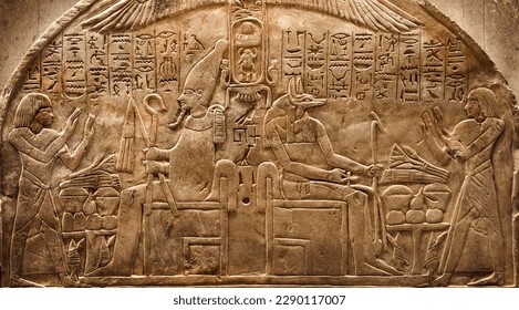 Ancient Egyptian deities Osiris and Anubis, Egyptian hieroglyphs.  Historical and culture background. Ancient Egyptian hieroglyphs as a symbol of the history of the Earth.  