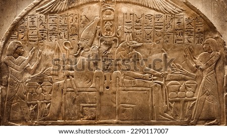 Ancient Egyptian deities Osiris and Anubis, Egyptian hieroglyphs.  Historical and culture background. Ancient Egyptian hieroglyphs as a symbol of the history of the Earth.  