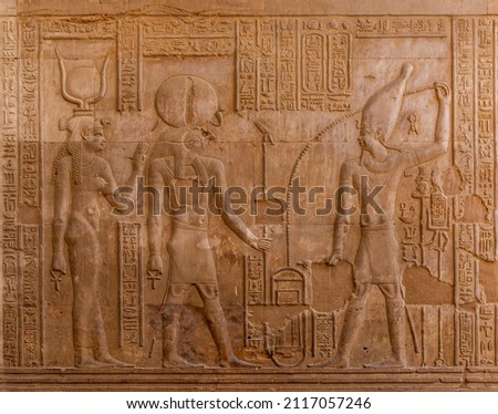 Ancient Egyptian hieroglyph writings on Temple wall
