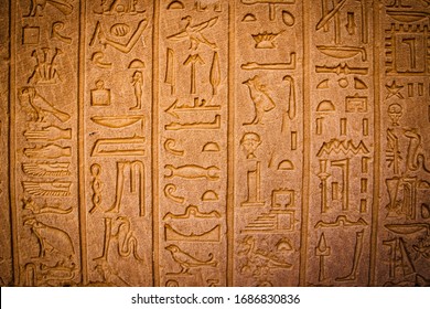 Ancient Egyptian writing, Egyptian hieroglyphs, wall inscriptions - Shutterstock ID 1686830836