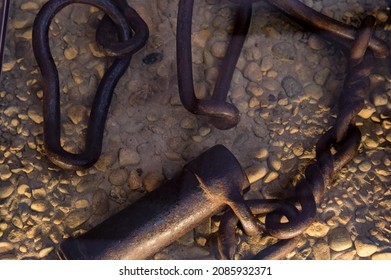 Ancient Fetters Or Legcuffs On The Ground Close-up