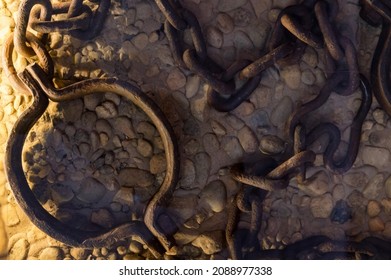 Ancient Fetters Or Legcuffs On The Ground Close-up