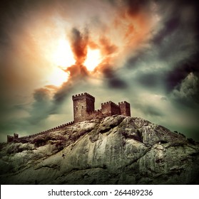 Ancient Fortress On The Hill Under Dramatic Sky