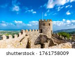 Ancient fortress tower on blue sky clouds background