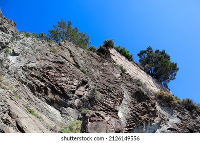 Ancient Fortress Wall On The Sheer Rock In Phaselis, Turkey