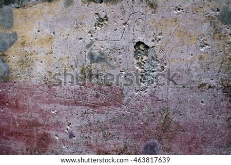 Ancient graffiti on the wall of a building in the ruins of Pompeii, destroyed by Mount Vesuvius, in 79AD