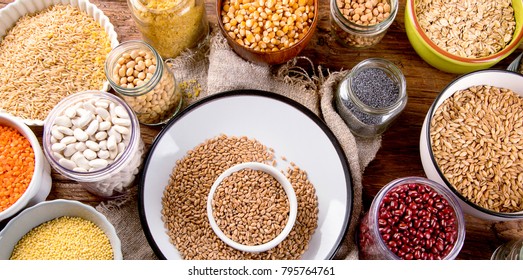 Ancient Grains, Seeds, Beans On Wooden Background. Top View