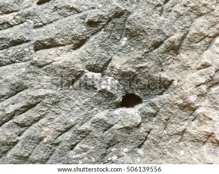 Ancient gray stone wallpaper background.