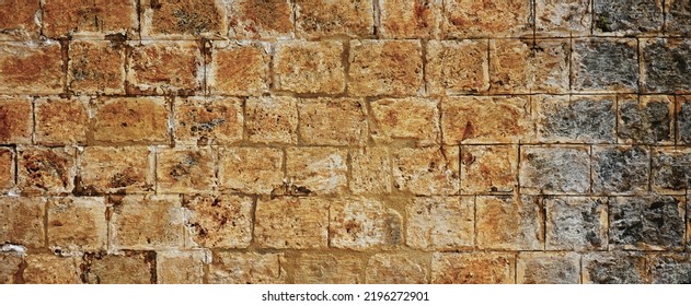 Ancient Greece, Egypt, Rome Wall. Worn Stone Laying Old Brickwork Construction Textured Wallpaper Web Banner Interior Decision High Quality Photo