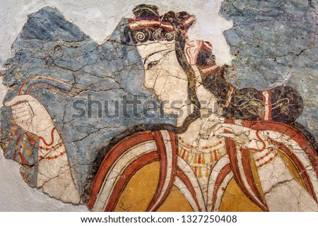 Ancient Greek fresco of woman. Remains of culture of past civilization in Greece. Beautiful wall painting, hellenistic Greek art. Cracked mural close-up. Athens history and archaeological antiquity.