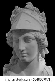 Ancient Greek Goddess Athena Pallas Statue Isolated On Black. Marble Woman Head In Helmet Sculpture.