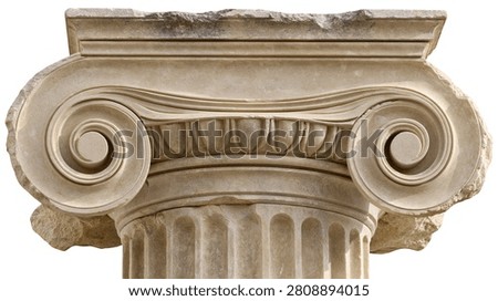 Ancient Greek Ionic column capital with decorative volutes and fluted shaft