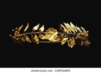 Ancient Greek pure gold crown with laurel leaves and central figure of a flower.