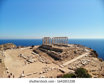 The Ancient Greek Temple Of Poseidon At Cape Sounion, Built During 444–440 BC, Is One Of The Major Monuments Of The Golden Age Of Athens