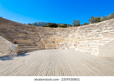 The ancient Greek theatre at the Antiphellus or Antiphellos Ancient City in modern Kas or Kash town in Antalya Province in Turkey - Powered by Shutterstock