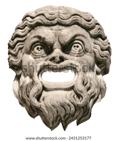 Ancient Greek theatre mask carved of stone, frightening or smiling face expression, isolated