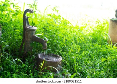 Ancient Groundwater Pump In The Lawn