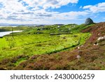 The ancient hilltop ruins of the Dun Carloway Broch on a sunny summer day in the district of Carloway, Isle of Lewis, Scotland, United Kingdom.	