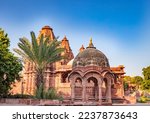 ancient hindu temple architecture with bright blue sky from unique angle at day shot taken at mandore garden jodhpur rajasthan india.