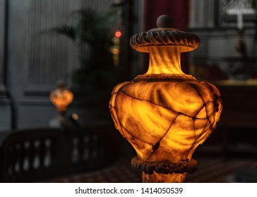 ancient illuminated alabaster vase shows numerous cracks - Shutterstock ID 1414050539