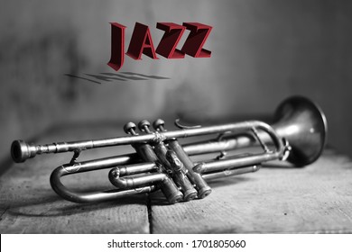 An Ancient Jazz Trumpet On An Old Wooden Table