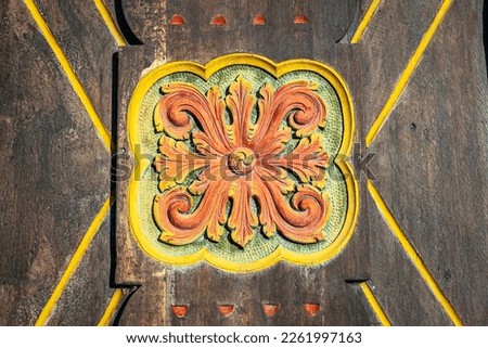 Ancient Lom Stave Church wooden door ornate carving, Norway, Scandinavia