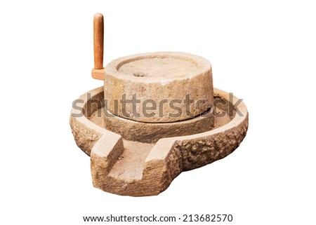 Ancient manual stone mill on a white background with path.