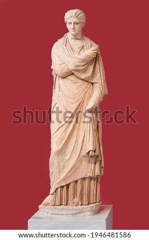 Ancient marble female funerary statue from Aigion, Peloponnese, Greece, dating from about 300 B.C. The female figure is depicted in the type of the Small Herculaneum woman.
