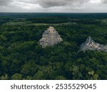 Ancient Mayan Pyramid Ruin in deep Jungle from above - Drone Footage