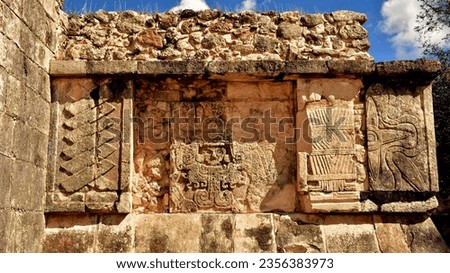 Ancient Mayan stone reliefs at Chichen Itza ruins in Yucatan, Mexico. El Castillo (The Kukulkan Temple). New Seven Wonders of the Wolrd.
