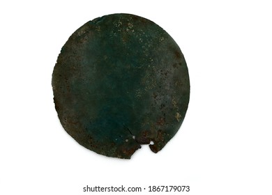 Ancient Metal Mirror Of The Bronze Age On A White Background