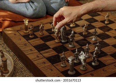 Ancient Metal Roman Chess Set With Silver And Gold Plated Pieces On Solid Oak Wood Board. Concept Image For Business Strategy, Competition, Relaxation, Recreation And Mental Agility.