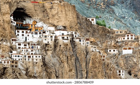 Ancient monastery built into the rugged mountainside.