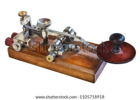 Ancient morse code telegraphy device isolated on a white background