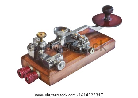 Ancient morse code telegraphy device isolated on a white background