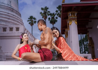 Ancient Muay Thai ,Thai is boxing fighter sport .Muay Thai fighters wear traditional boxing gloves. Inside the temple at the World Heritage City of Ayutthaya