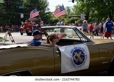 Ancient old  emergency cars vehicles tractor in Memorial Day Celebration parade US flags balloons fire truck police car Sheriff political candidates in small town May 30 2022 Grayslake IL