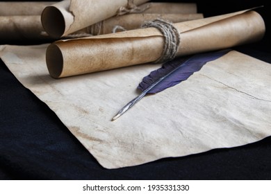 Ancient Paper Scrolls Sealed With A Seal On An Old Map. Pen For Writing.