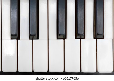 Ancient Piano Ivory Keys Close Up. Top View