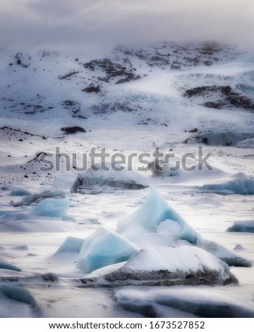 Similar – Island | Vögel auf einem Eisberg in einer Gletscherlagune