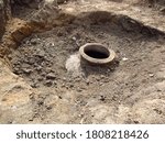 An ancient pitcher was found in the ground