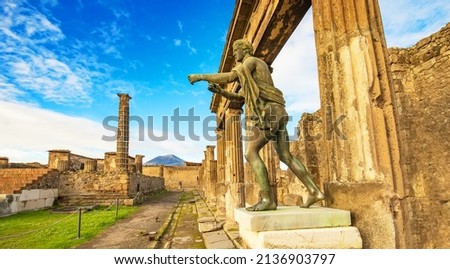 Ancient Pompei city skyline and bronze Apollo statue, Italy travel photo. Pompei one of the most popular tourist attractions in Italy
