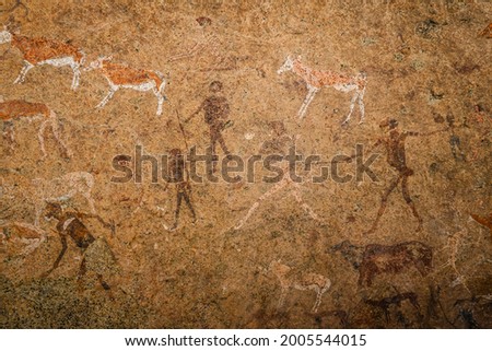 Ancient prehistoric cave painting known as the White Lady of Brandberg dating back at least 2000 years and located at the foot of Brandberg Mountain in Damaraland, Namibia, Africa.
