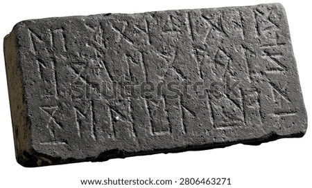 Ancient rectangular stone tablet with carved runic inscriptions and symbols