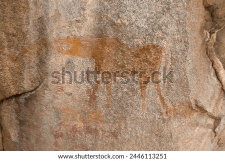 Ancient rock art of a painting depicting an animal, at Matobo National Park, Zimbabwe, Africa