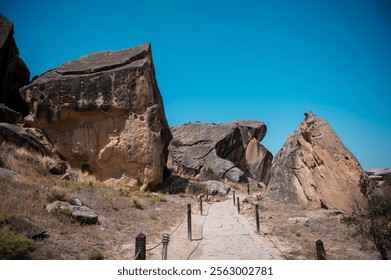 Ancient rock carvings Gobustan State Historical and Cultural Reserve southwest of the center of Baku prehistoric rock carvings, mud volcanoes and musical stones in the region archeological monuments