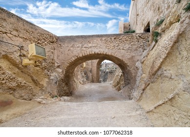 Ancient Rock Structure Created At The Time Of Spanish Conquistadors. Part Of A Massive Fortress On Top Of A Hill In A Small Town In Spain. Public Event Place For Reenactment And Live Action Role Play