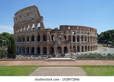 Ancient Roman amphitheater and gladiator arena Colosseum aerial view, heart of Roman Empire, famous tourist landmark, guided tour concept, Rome, Italy