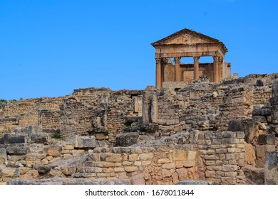 Ancient Roman Archaeological Site Of Dougga
The Capitol Is A Roman Temple From The 2nd Century CE, Dedicated To Rome's Protective Triad: Jupiter Optimus  Maximus,Juno Regina And Minerva Augusta.