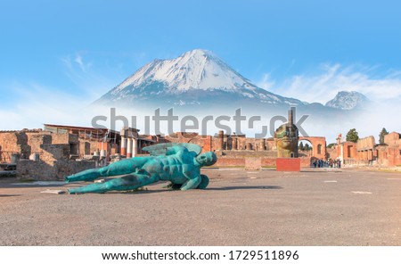 Ancient Roman city of Pompeii on the background Vesuvius volcano
